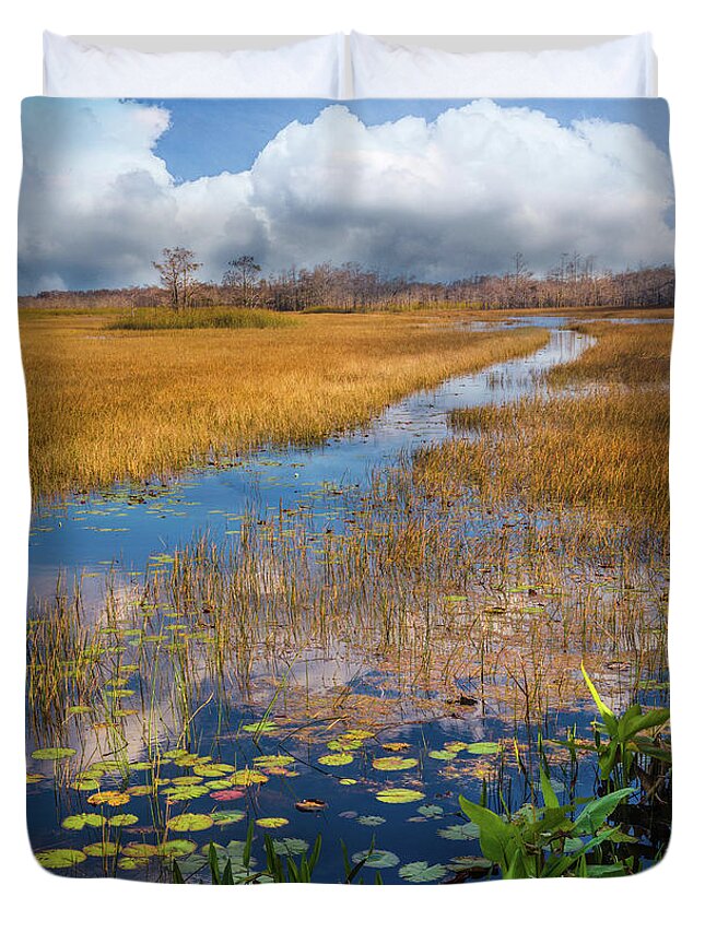 Clouds Duvet Cover featuring the photograph Stream Through the Everglades by Debra and Dave Vanderlaan