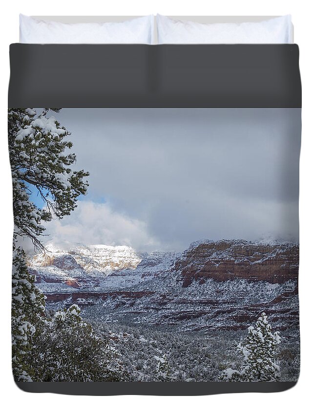 Sedona Duvet Cover featuring the photograph Sunlit Snowy Cliff by Laura Pratt