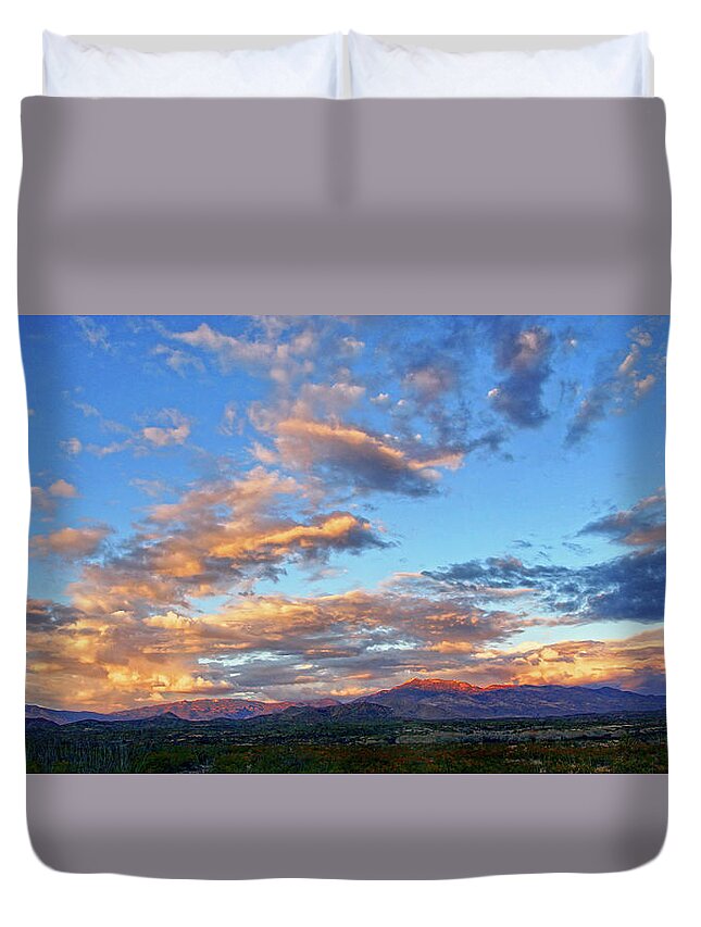 Clouds Duvet Cover featuring the photograph Sunset Glow by Leda Robertson