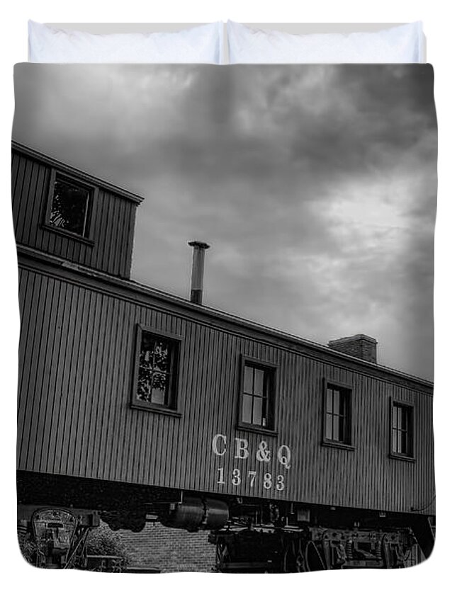 Railroad Duvet Cover featuring the photograph The Depot Under Cloudy Skies Black and White by Dale Kauzlaric