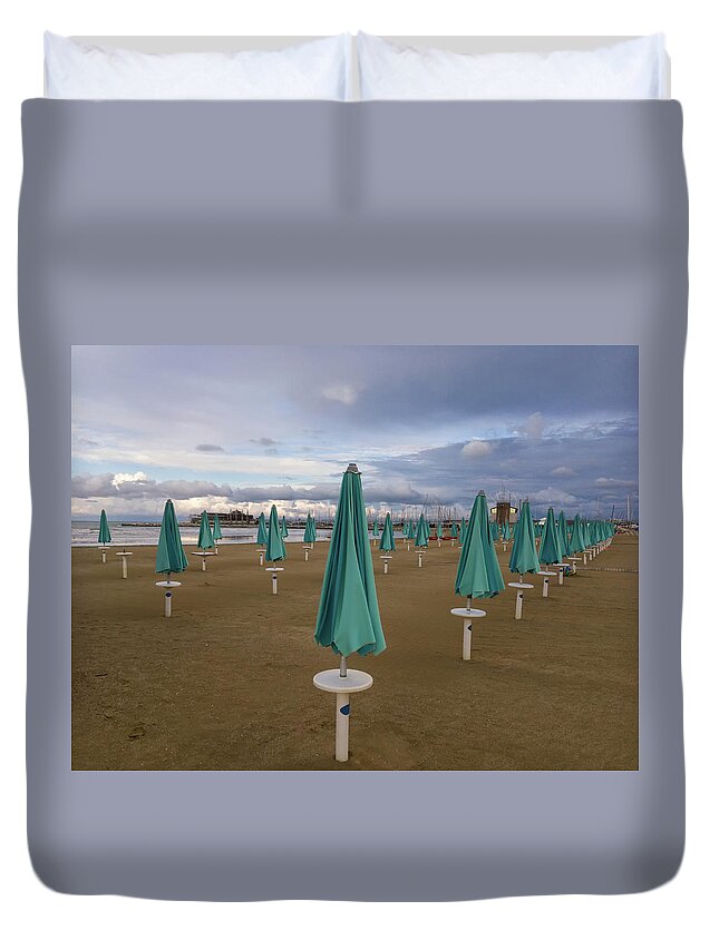 The End Ofthe Season In Rimini By Marina Usmanskaya Duvet Cover featuring the photograph The end of the season in Rimini by Marina Usmanskaya