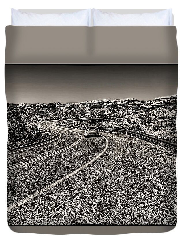 Pictorial Duvet Cover featuring the photograph The Road Goes on Forever by Roger Passman