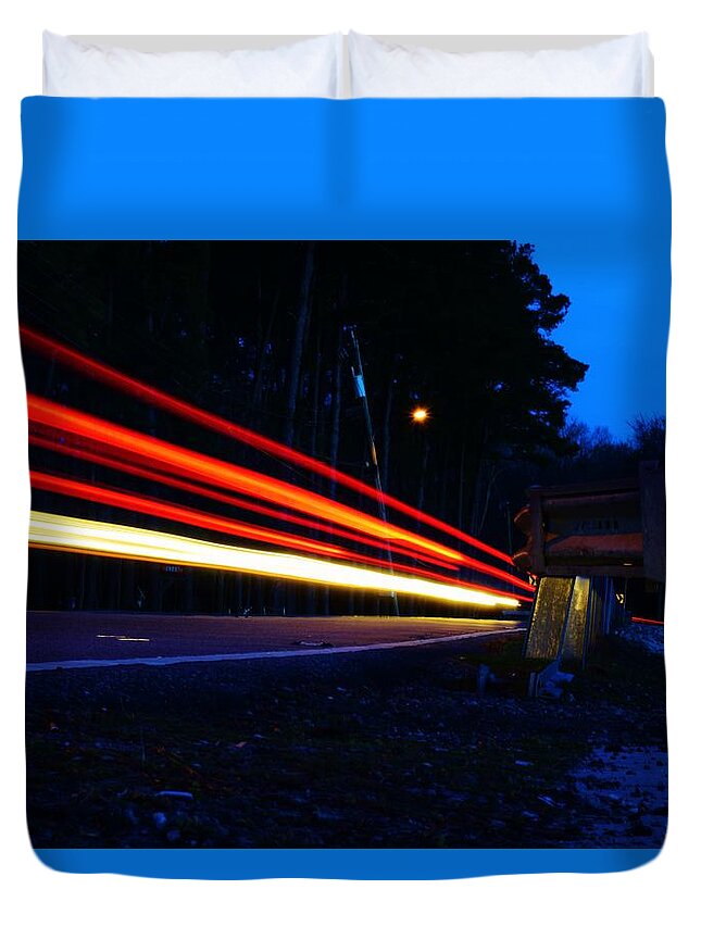 Light Trail Duvet Cover featuring the photograph The Trail To... by Nicole Lloyd