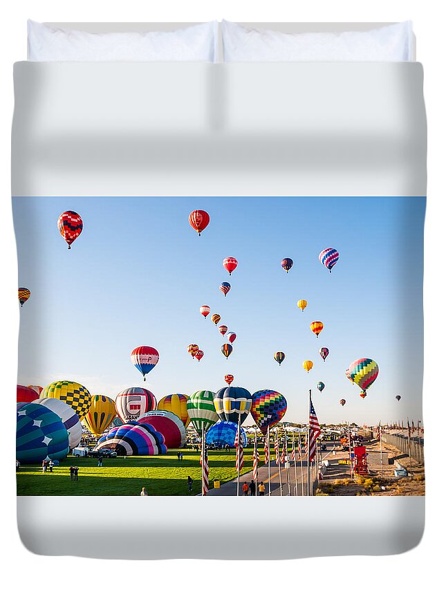 Hot Air Balloons Duvet Cover featuring the photograph They all go by Charles McCleanon