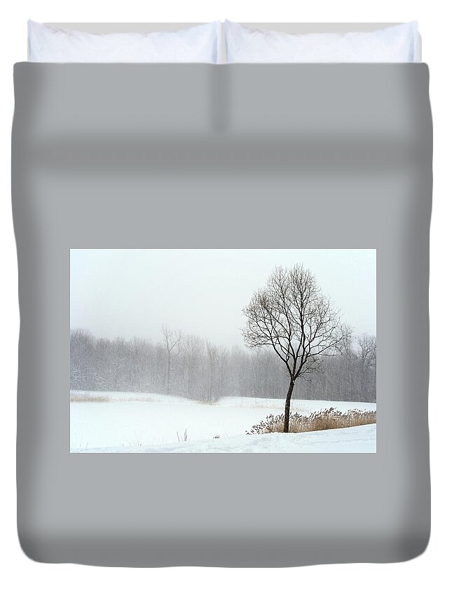 Winter Duvet Cover featuring the photograph Tree in misty haze of winter blizzard by GoodMood Art