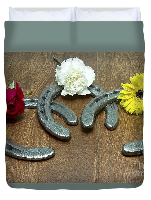 Triple Crown Duvet Cover featuring the photograph Triple Crown Flowers on Horseshoes by Karen Foley