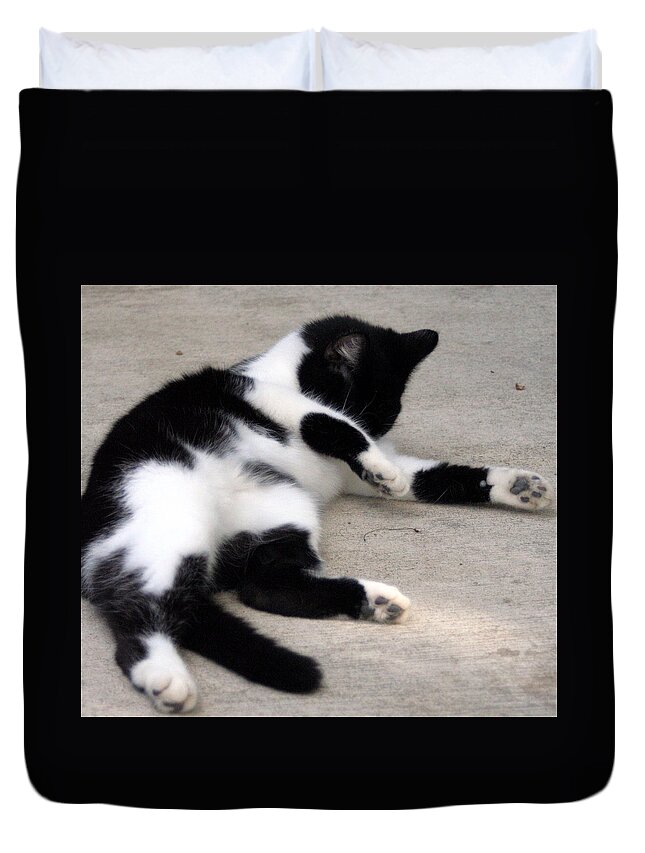 Cat Duvet Cover featuring the photograph Tuxedo Cat Grooming by Valerie Collins