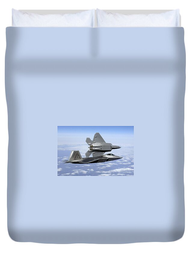 Aircraft Duvet Cover featuring the photograph Two F-22a Raptors In Flight by Stocktrek Images