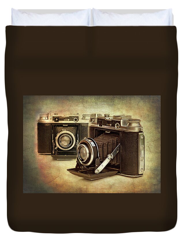 1945 Duvet Cover featuring the photograph Vintage Cameras by Meirion Matthias