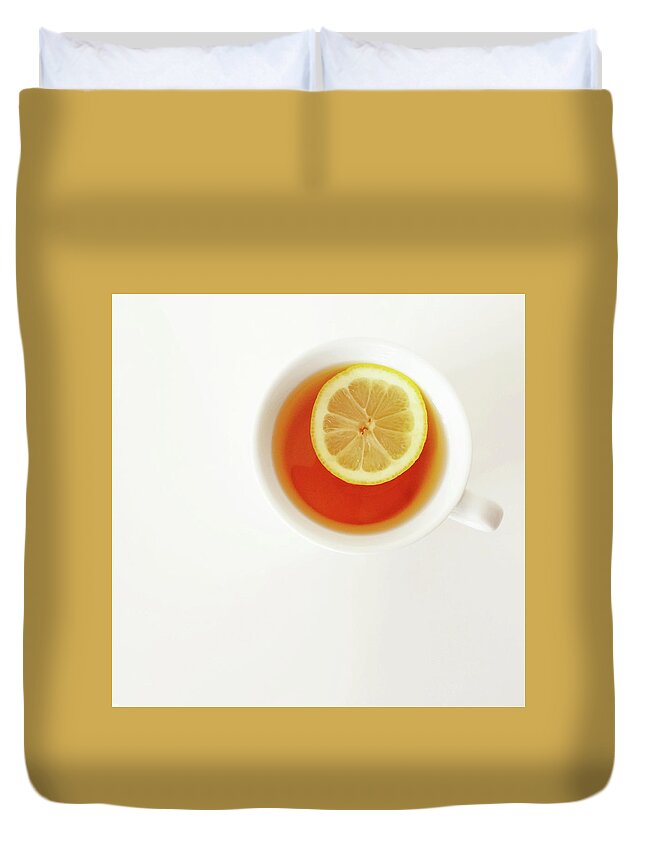 Tea Duvet Cover featuring the photograph White cup of tea with lemon by GoodMood Art