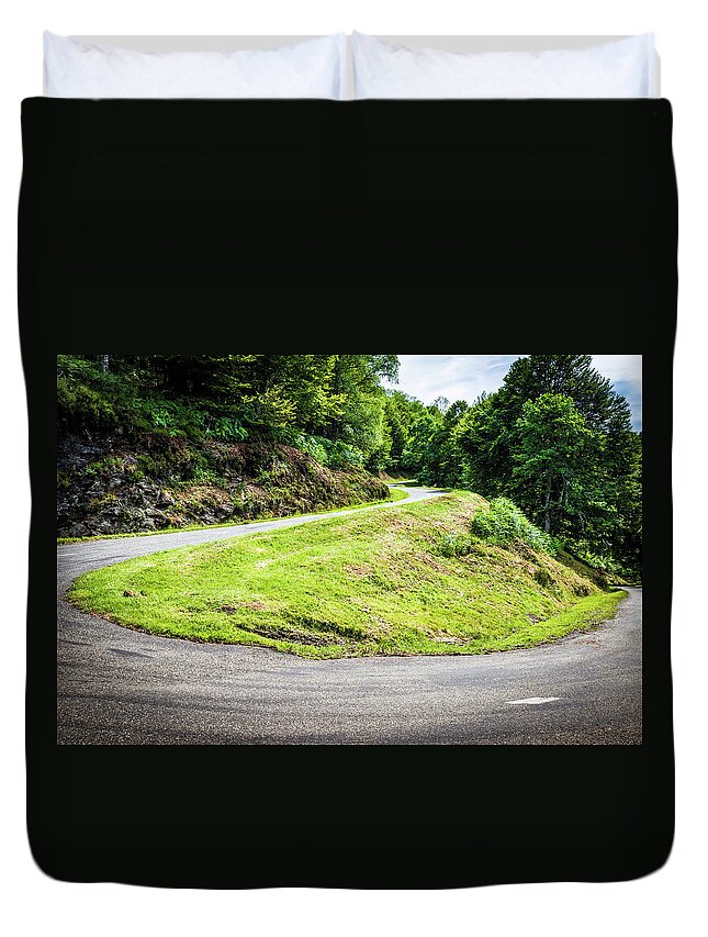Boussenac Duvet Cover featuring the photograph Winding road with sharp bend going up the mountain by Semmick Photo