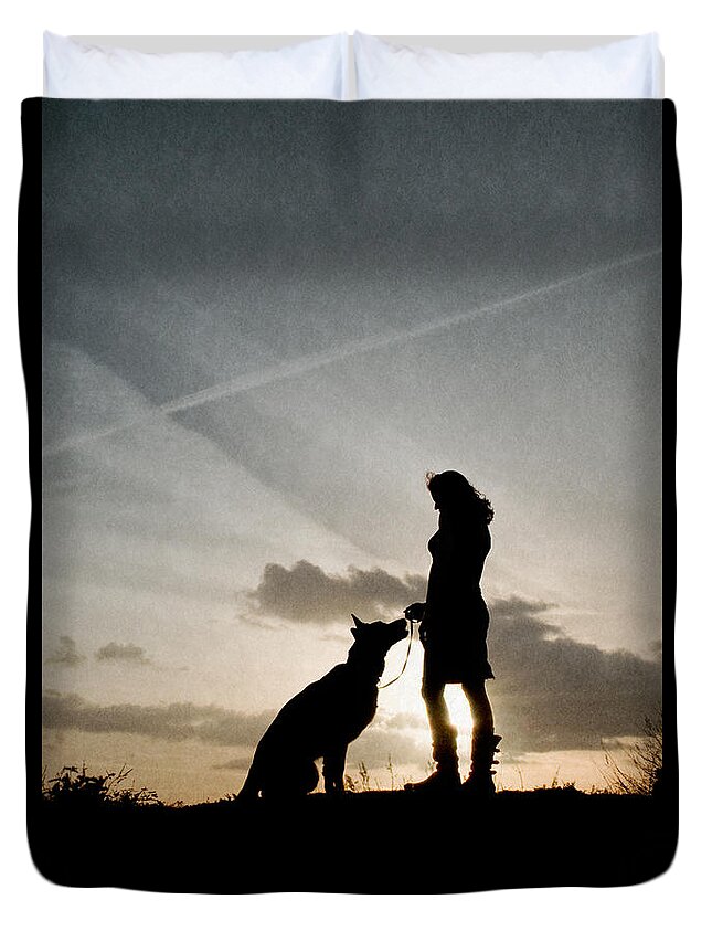 Sunset Duvet Cover featuring the photograph Woman and dog by Clayton Bastiani