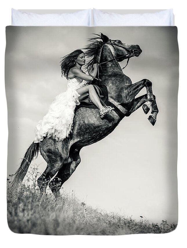 Horse Duvet Cover featuring the photograph Woman in dress riding chestnut black rearing stallion by Dimitar Hristov
