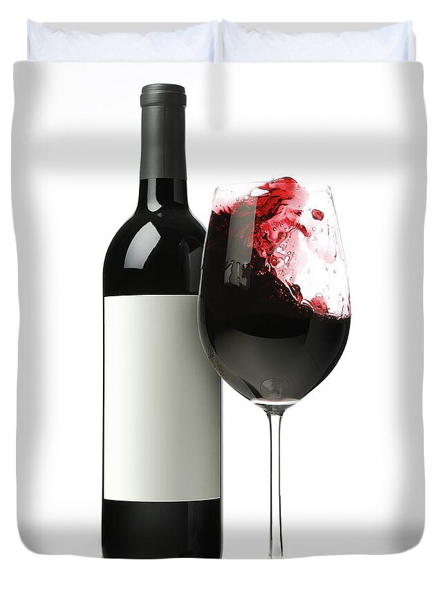 White Background Duvet Cover featuring the photograph A Glass Of Wine And A Bottle #1 by Nicholas Eveleigh
