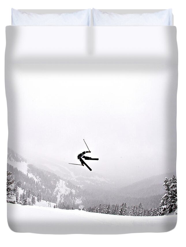 Skiing Duvet Cover featuring the photograph A Man Sideways In The Air On Teton #1 by Derek Diluzio