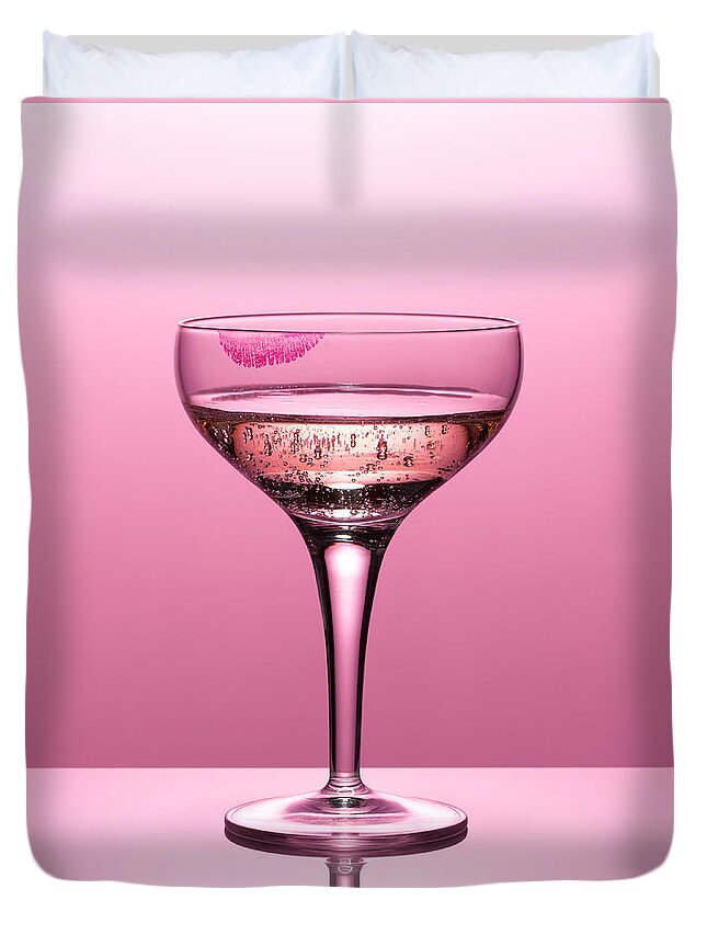 Temptation Duvet Cover featuring the photograph Close Up Of Pink Champagne In Glass #1 by Andy Roberts