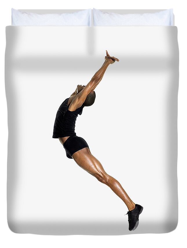 Young Men Duvet Cover featuring the photograph Male Dancer Jumping #1 by Image Source
