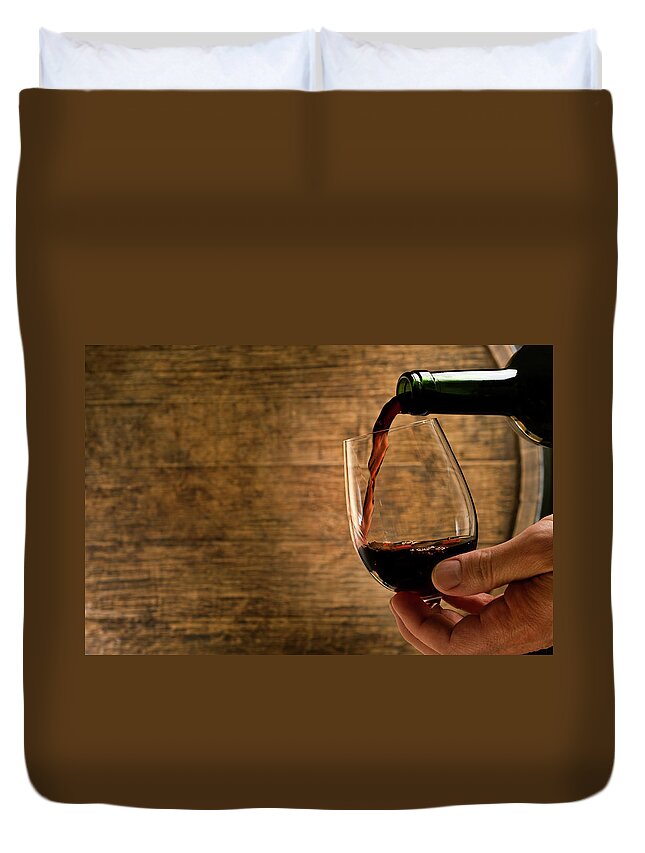 Alcohol Duvet Cover featuring the photograph Wine Pour In Cellar #1 by Markswallow