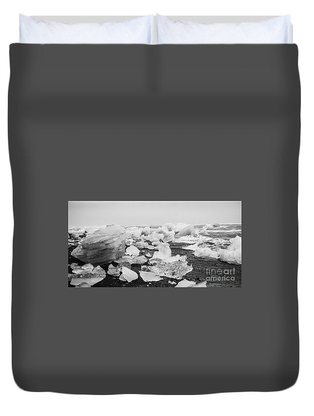 Arctic Duvet Cover featuring the photograph Giant ice blocks detached from icebergs on the coast of an Icelandic beach. #10 by Joaquin Corbalan