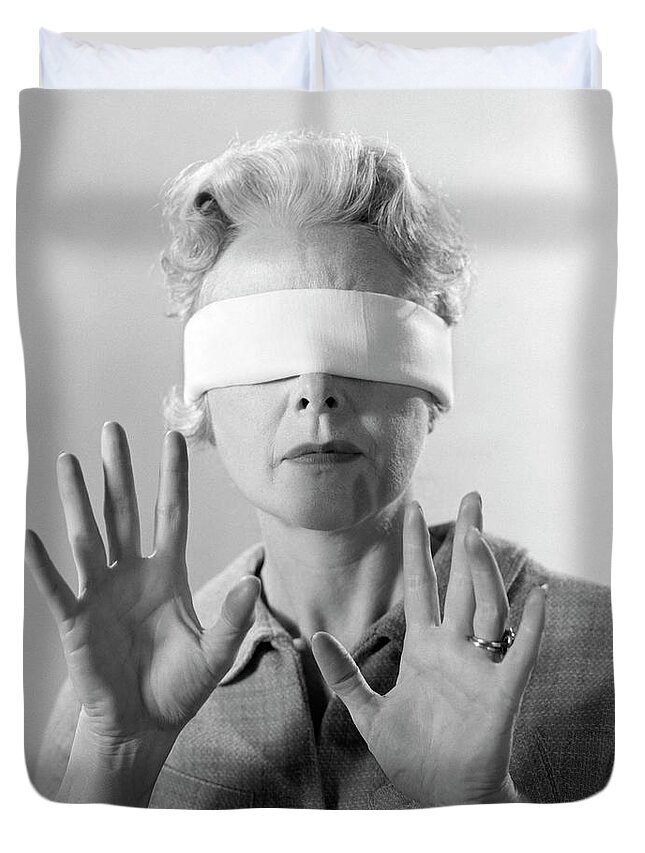 1960s Elderly Woman Wearing Blindfold by Vintage Images