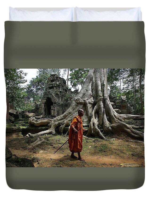 Orange Color Duvet Cover featuring the photograph Buddhist Monk At Angkor Wat Temple #3 by Timothy Allen