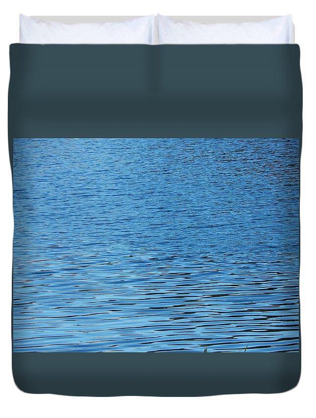 Water Duvet Cover featuring the photograph Texture of water ripples on the surface of the river #5 by Oleg Prokopenko