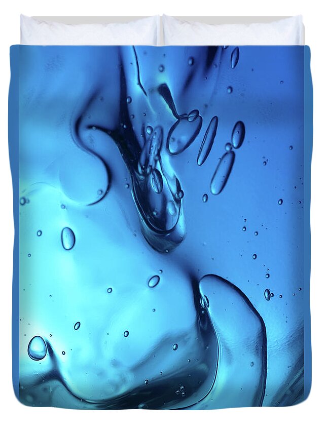 Curve Duvet Cover featuring the photograph A Design Of Liquid Blue With Drops by Seraficus