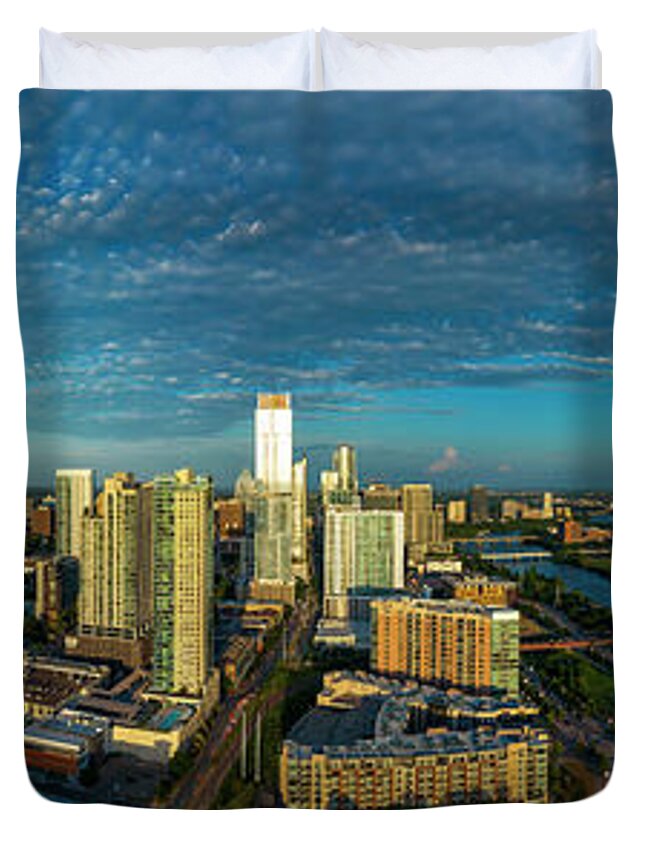 Austin Skyline Duvet Cover featuring the photograph A glorious view of the Austin Skyline during sunset from north to south including Lady Bird Lake by Dan Herron