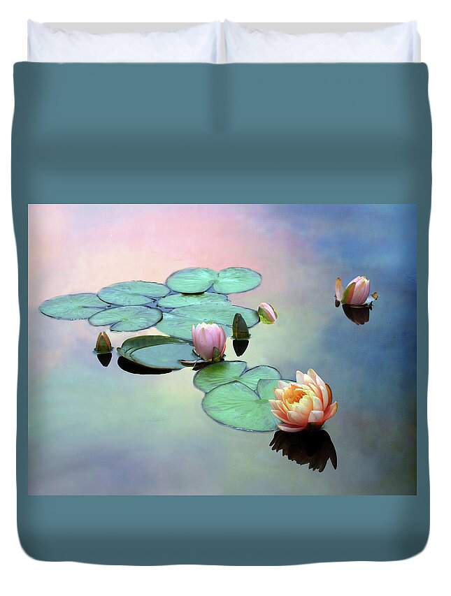 Lilies Duvet Cover featuring the photograph Afloat by Jessica Jenney