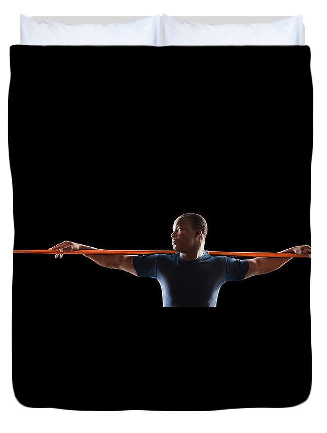 Young Men Duvet Cover featuring the photograph African American Man Holding Track And by Mike Kemp