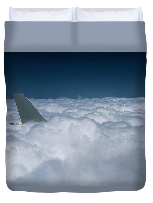 Risk Duvet Cover featuring the photograph Airplane Tail In A Sea Of Clouds by Buena Vista Images