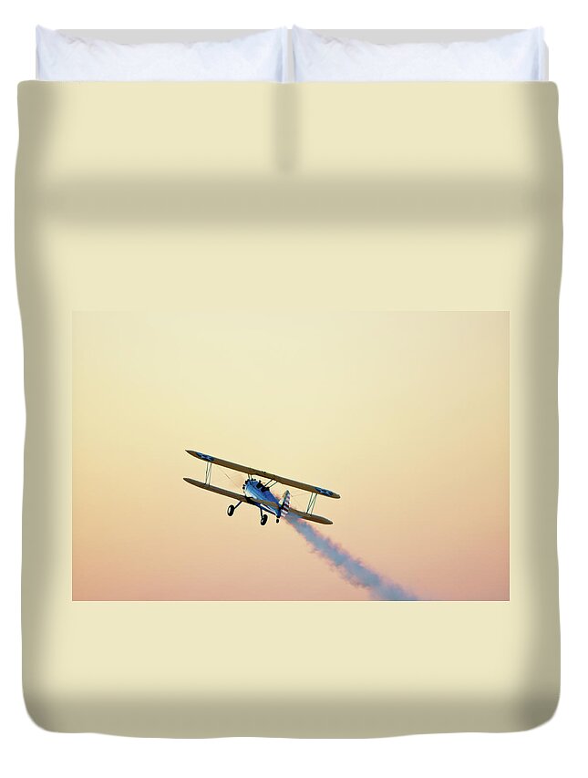 Performance Duvet Cover featuring the photograph Airshow Smoke Trail At Sunset by Jim Mckinley