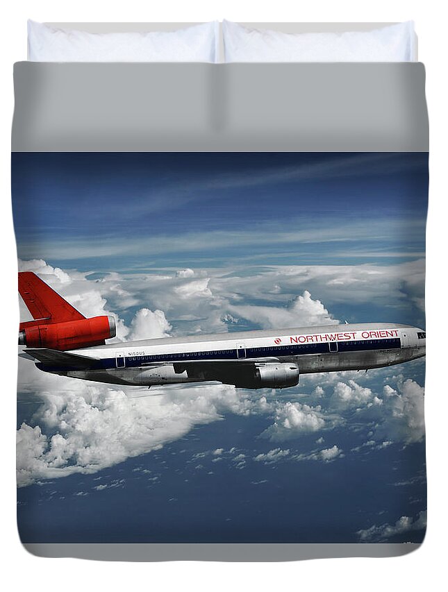 Northwest Orient Airlines Duvet Cover featuring the mixed media Among the Clouds - Northwest Orient DC-10-40 by Erik Simonsen