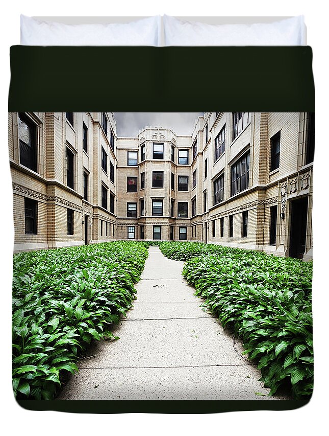 Apartment Duvet Cover featuring the photograph Apartment Buildings With Hostas In by Stevegeer