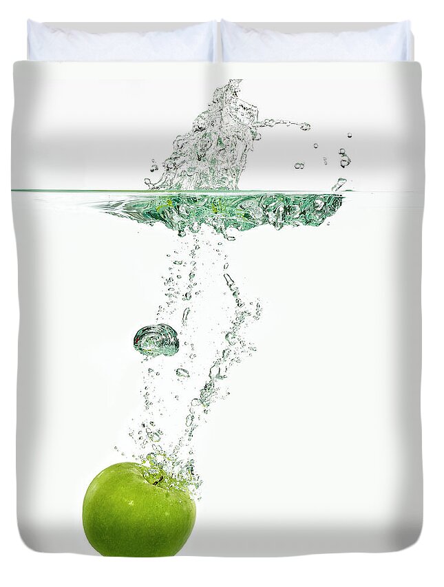 White Background Duvet Cover featuring the photograph Apple Dropping In Water by Mark Mawson