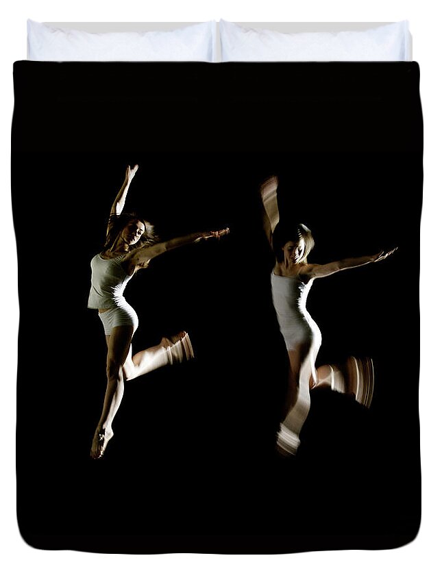 Expertise Duvet Cover featuring the photograph Ballet And Contemporary Dancers by John Rensten