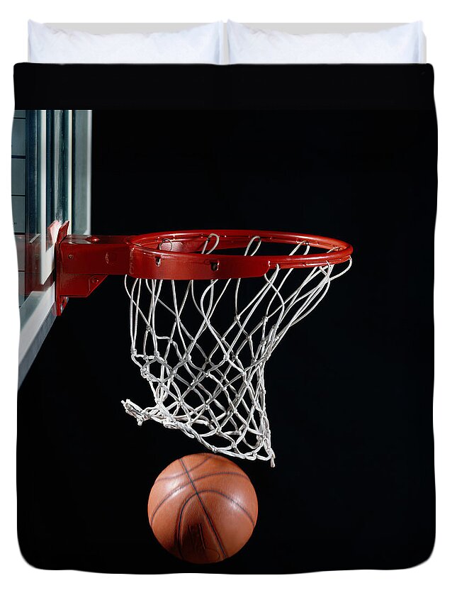 Accuracy Duvet Cover featuring the photograph Basketball In Hoop by Ryan Mcvay