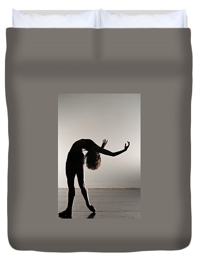 People Duvet Cover featuring the photograph Bending by Copyright Christopher Peddecord 2009