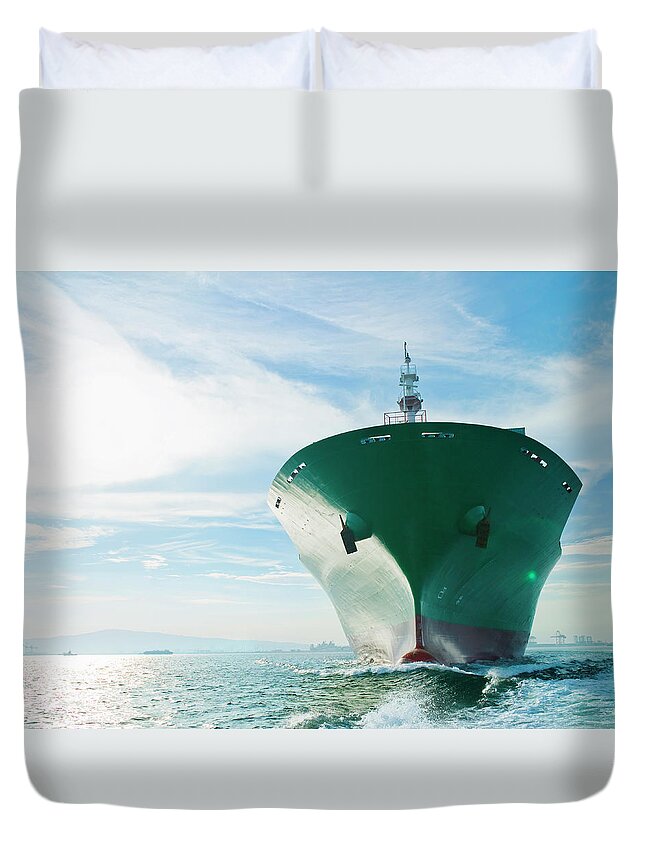 Trading Duvet Cover featuring the photograph Bow View Of Cargo Ship Sailing On Ocean by Stewart Sutton