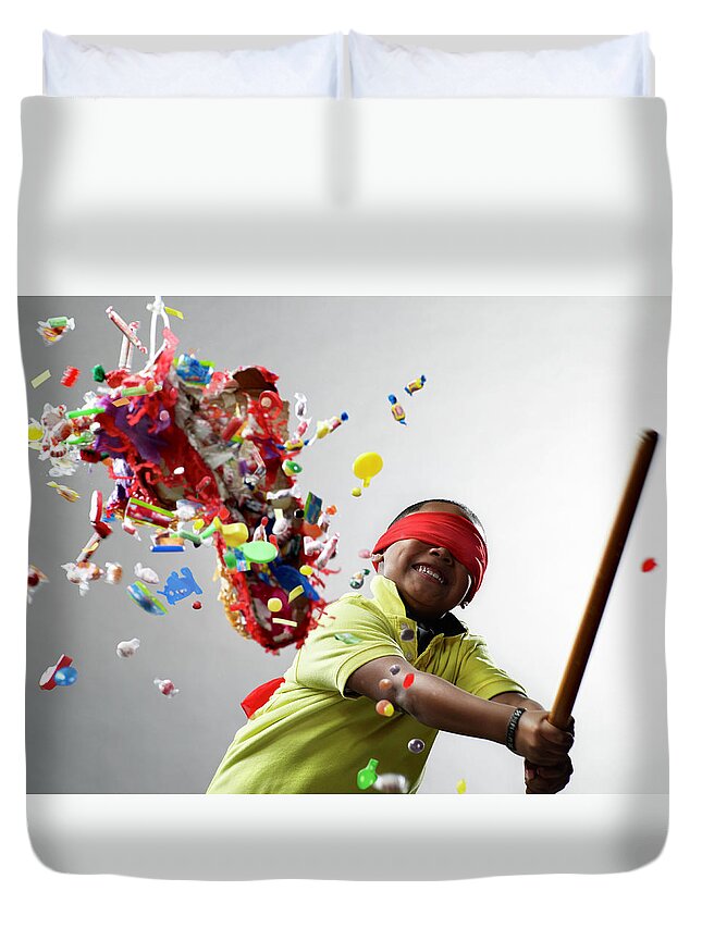 People Duvet Cover featuring the photograph Boy Smiling After Hitting Pinata by Ryan Mcvay