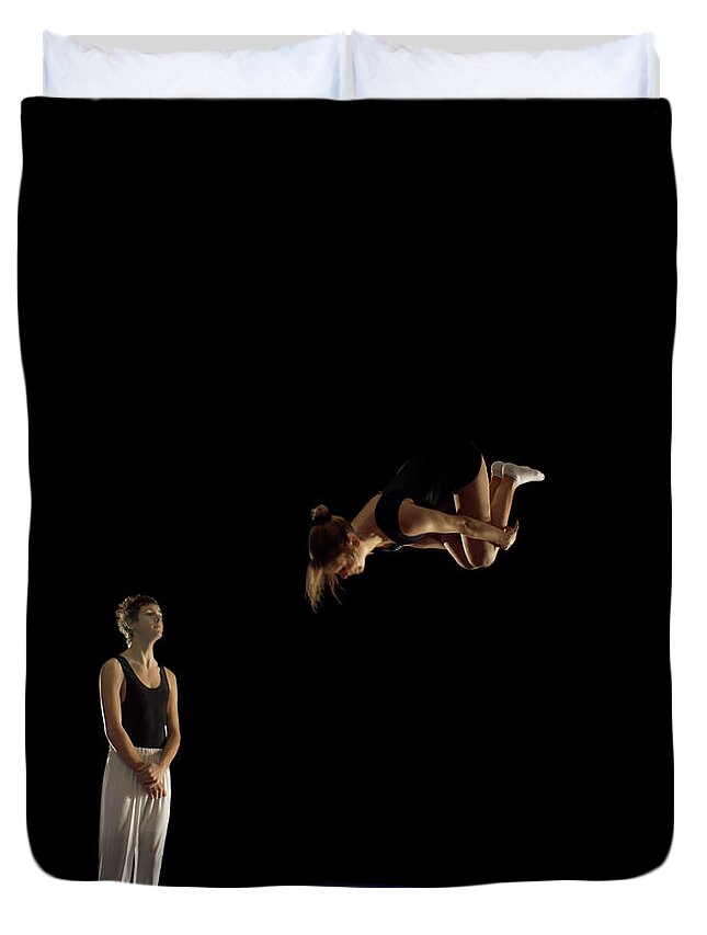 Young Men Duvet Cover featuring the photograph Boy Watching Girl On Trampoline by Peter Muller