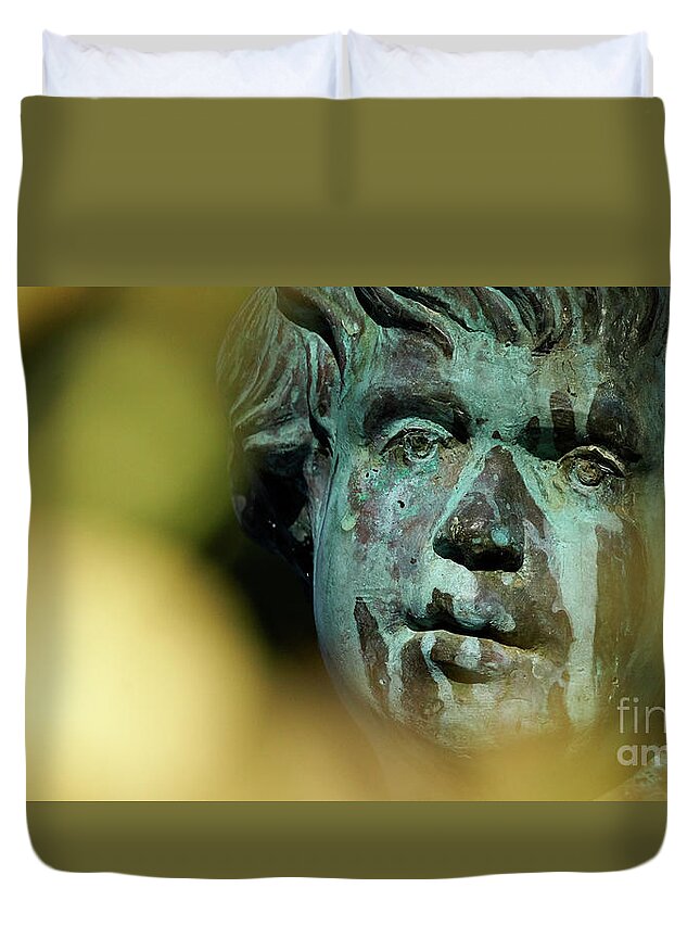 Cherub Duvet Cover featuring the photograph Bronze cherub Statue at Apodaca Mall by Pablo Avanzini