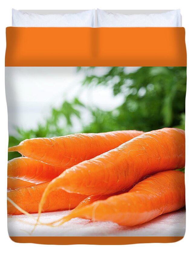 White Background Duvet Cover featuring the photograph Bunch Of Fresh Carrots, Close Up by Westend61