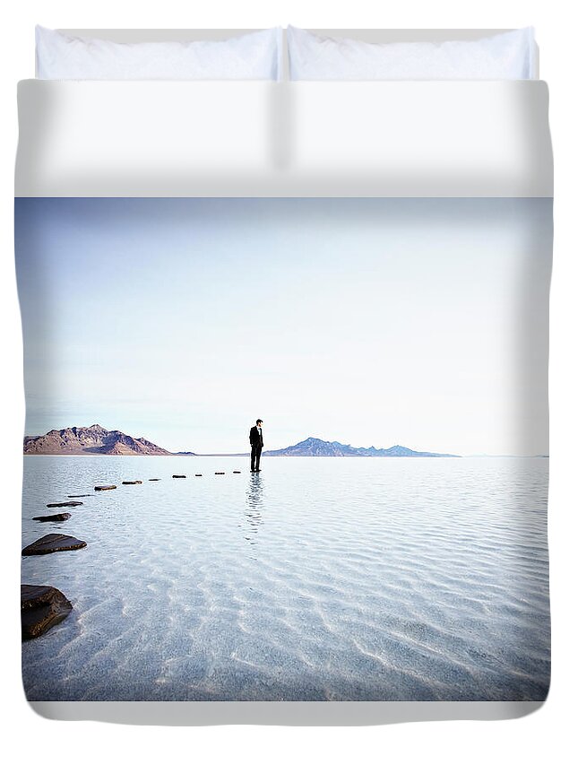 Problems Duvet Cover featuring the photograph Businessman Standing At The End Of by Thomas Barwick