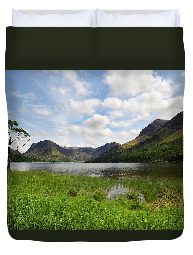 Water's Edge Duvet Cover featuring the photograph Buttermere Lakeside Tree by Simonbradfield
