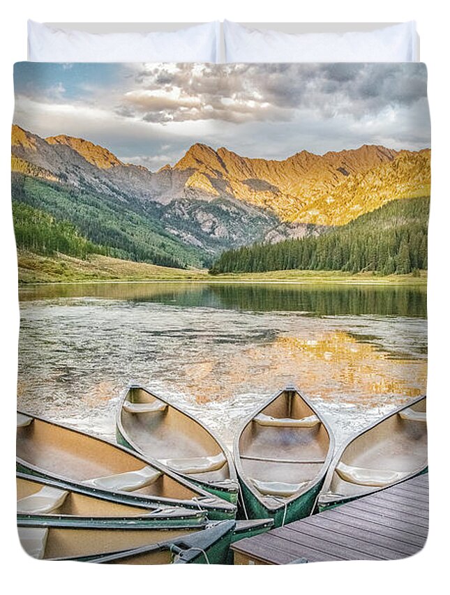 Canoe Duvet Cover featuring the photograph Canoes at Sunset by Melissa Lipton