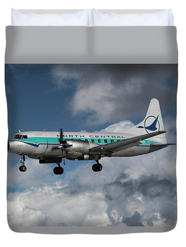 North Central Airlines Duvet Cover featuring the photograph Classic North Central CV-580 Landing at Minneapolis by Erik Simonsen
