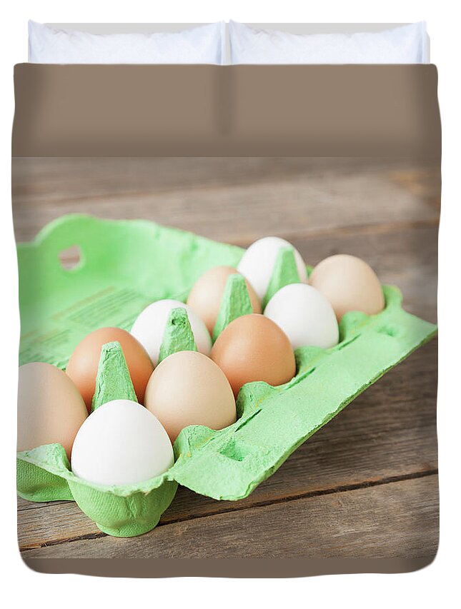Environmental Conservation Duvet Cover featuring the photograph Close Up Of Carton Of Mixed Eggs by Stefanie Grewel