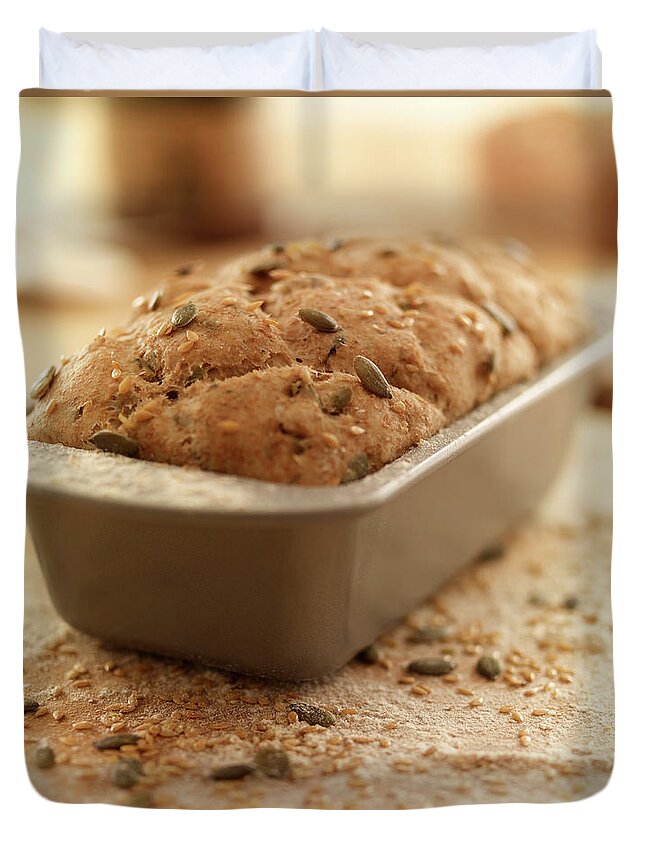 Close-up Duvet Cover featuring the photograph Close Up Of Rustic Bread In Loaf Pan by Adam Gault