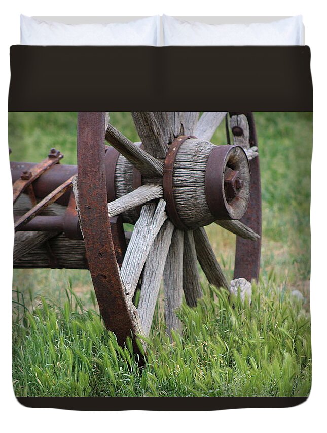 Wagon Wheel Duvet Cover featuring the photograph Closeup Vintage Wooden Wagon Wheel in Grass by Colleen Cornelius